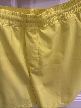 Lululemon men’s 5” Large Pace Breaker Bright Yellow Elastic Waist Shorts